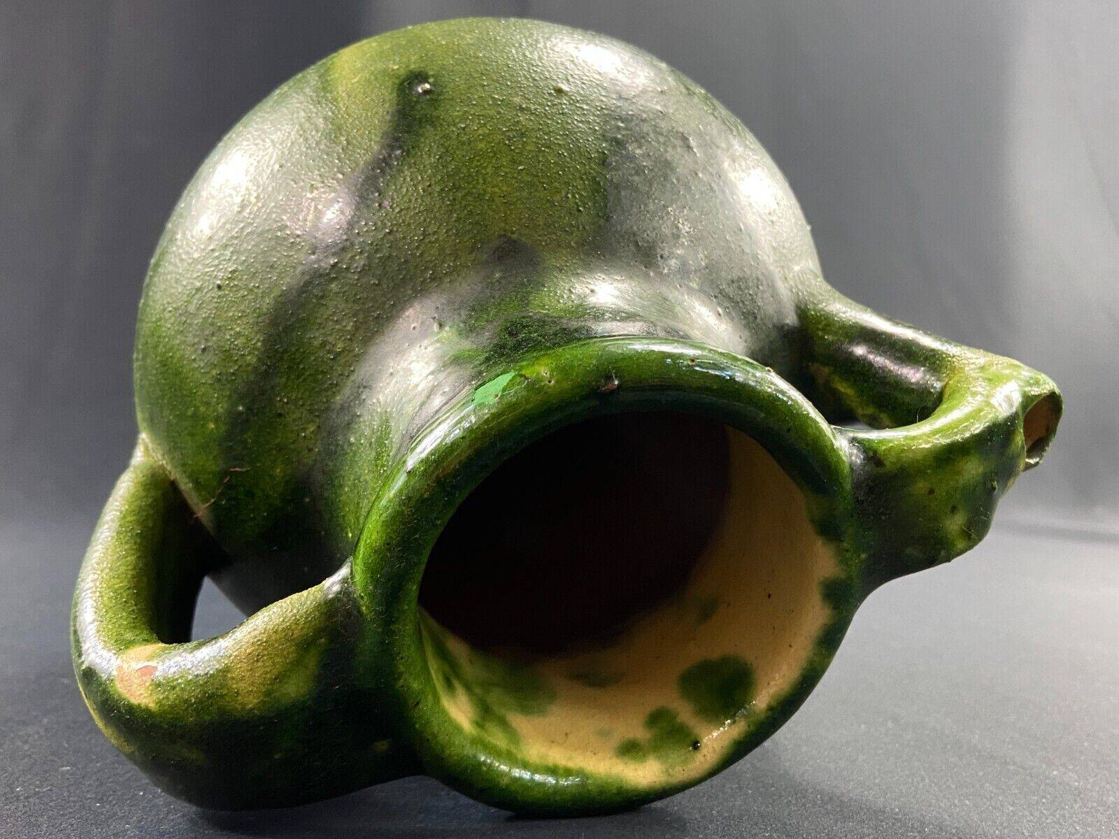 19th century green enamelled stoneware jug