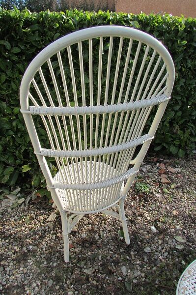 Low armchair in wicker and rattan