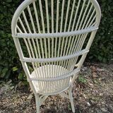 Low armchair in wicker and rattan