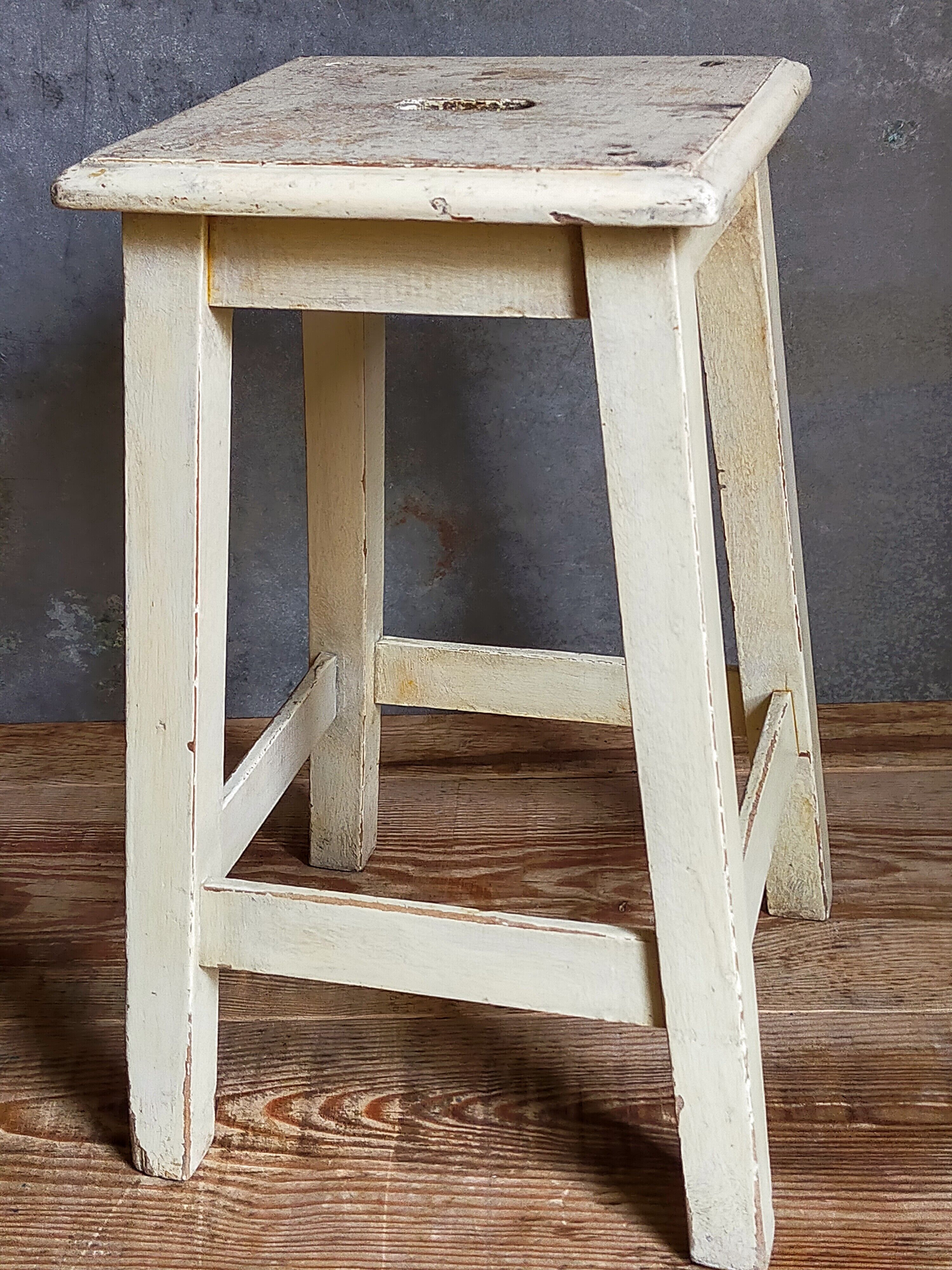 Wooden workshop stool with old patina