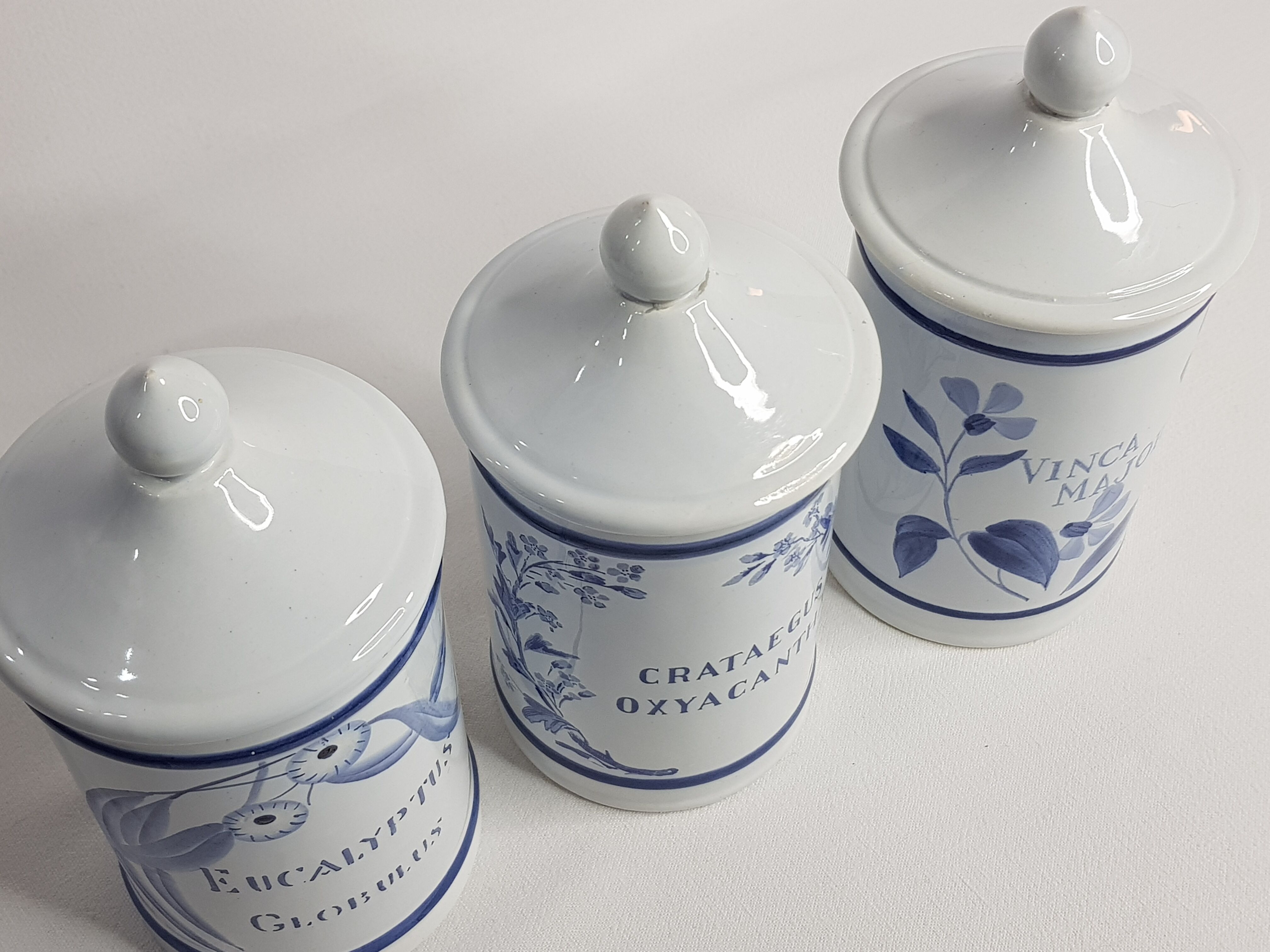 Set of three longchamp earthenware pharmacy jars