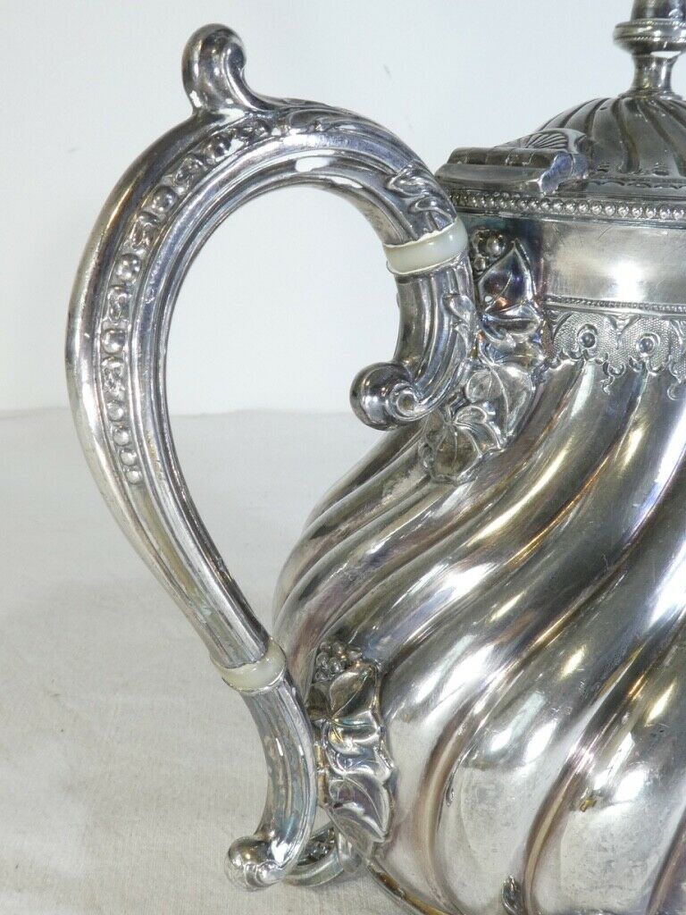 Silver flat silver metal teapot