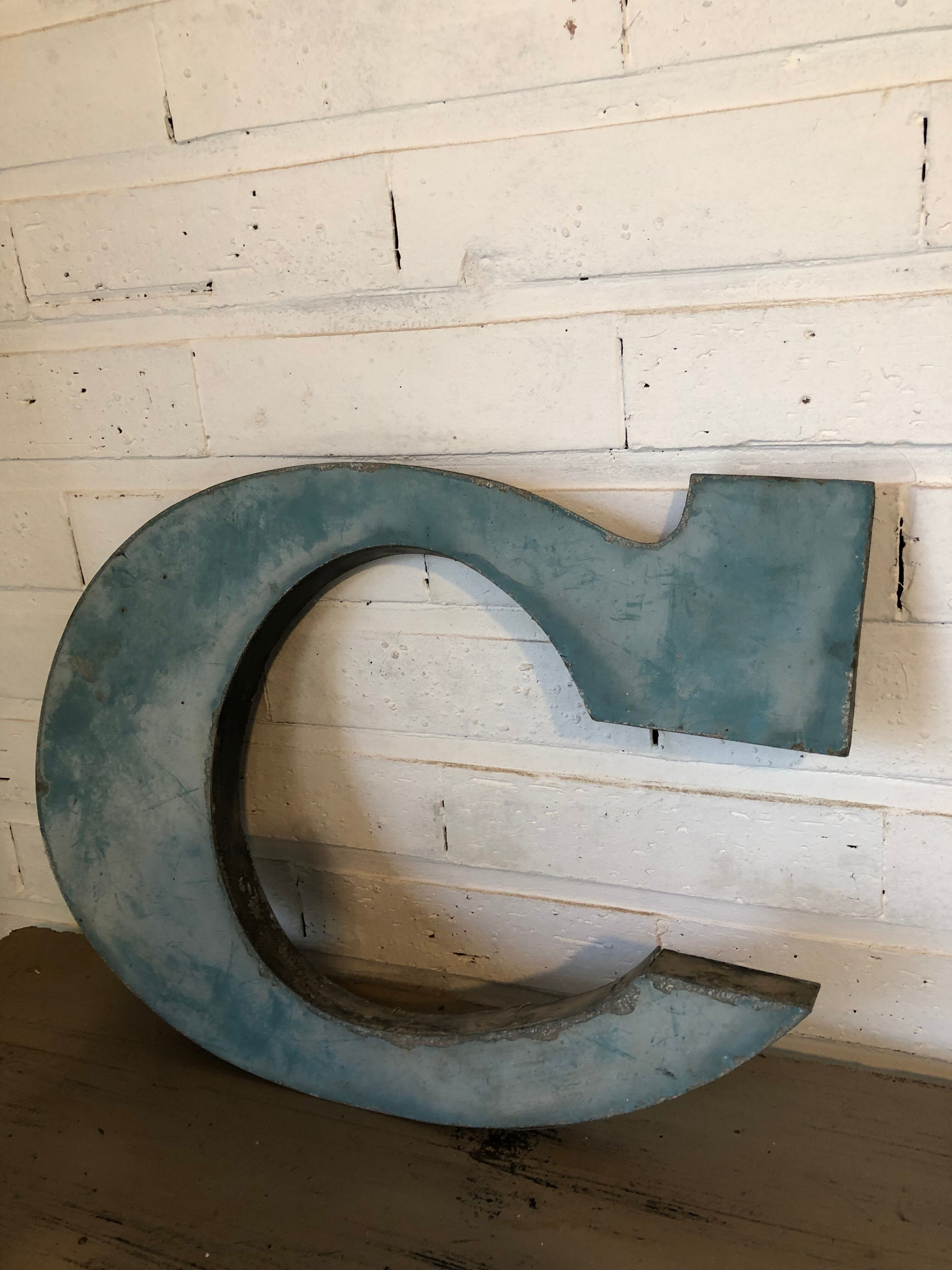 Blue sign letter "C"