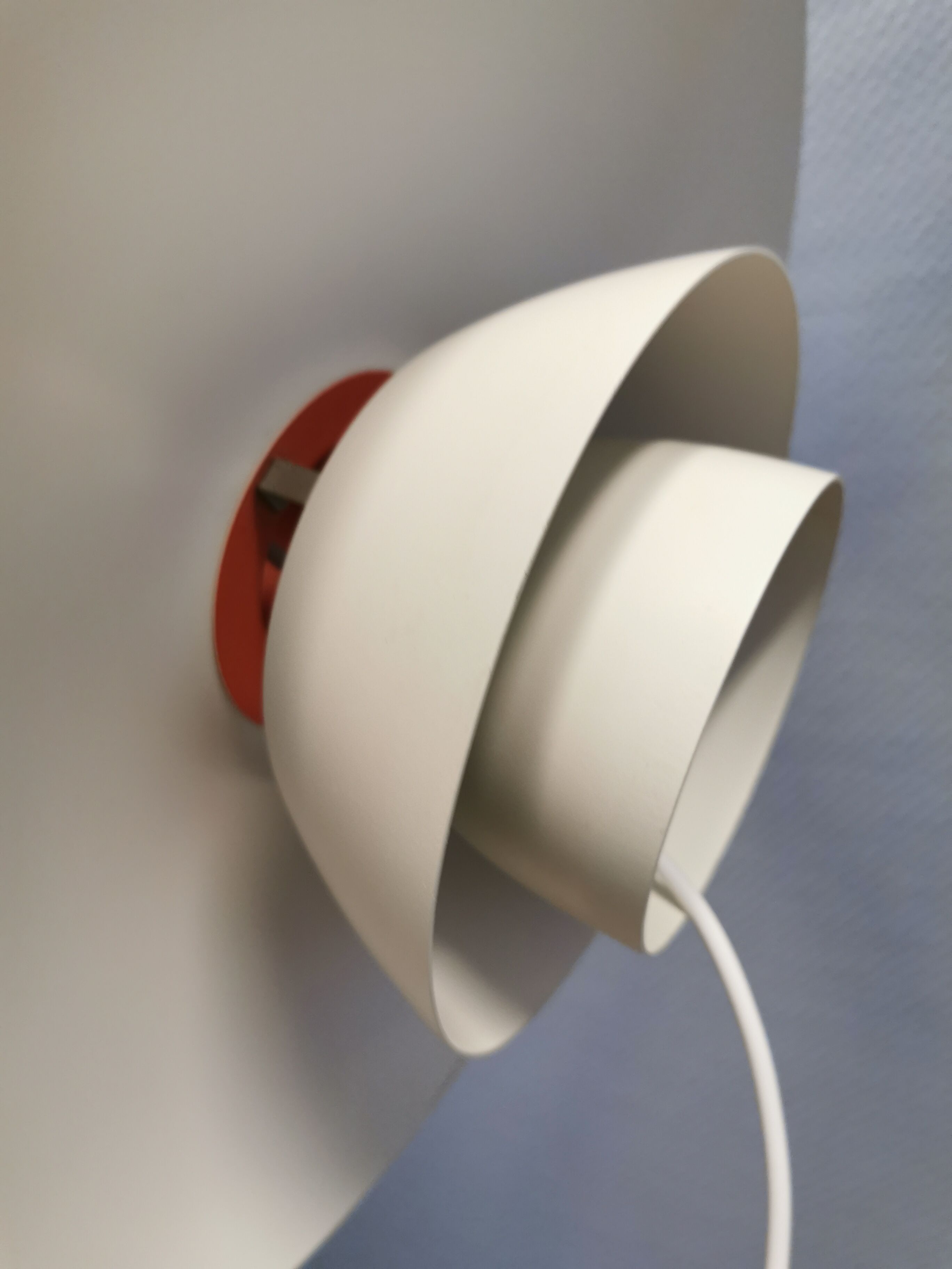 Older ph 4/3 hanging lamp, in white, with original orange suspension disk.