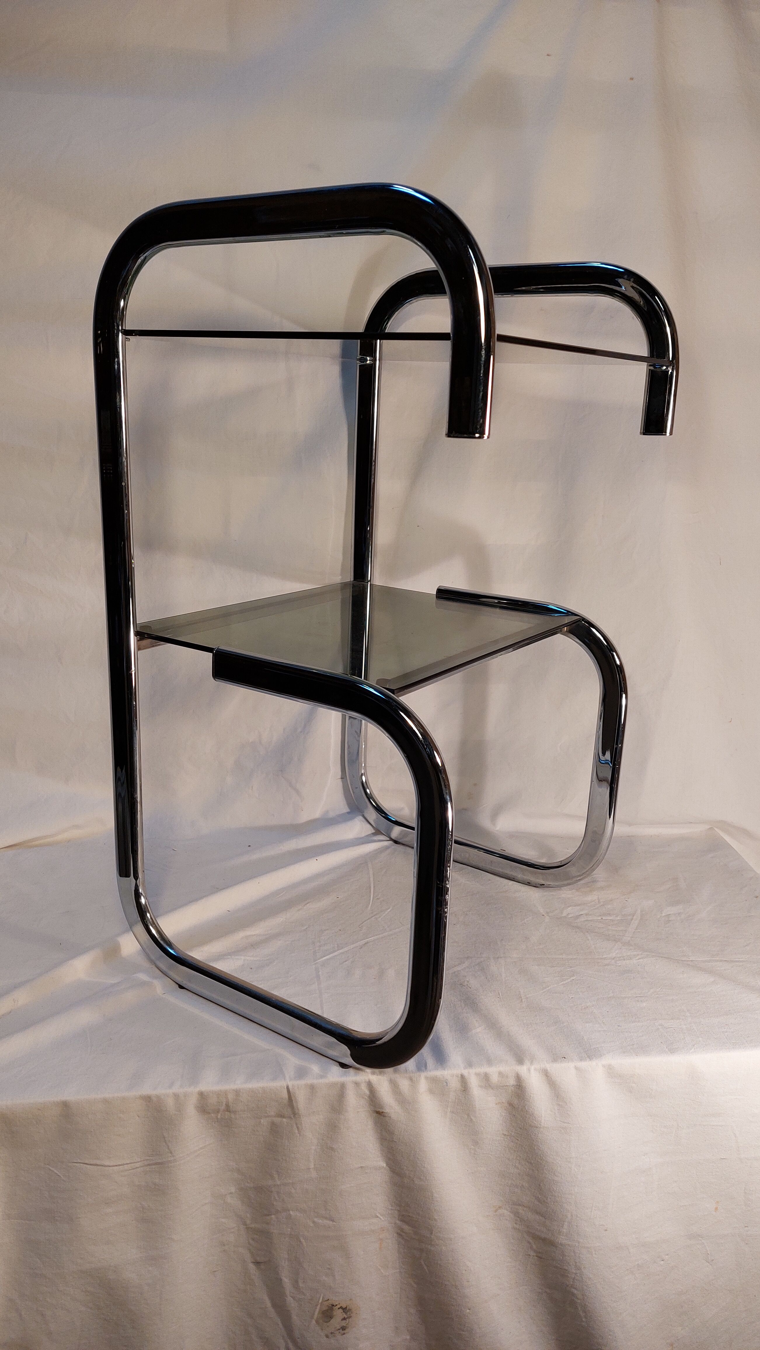 Vintage side table in chrome and smoked glass