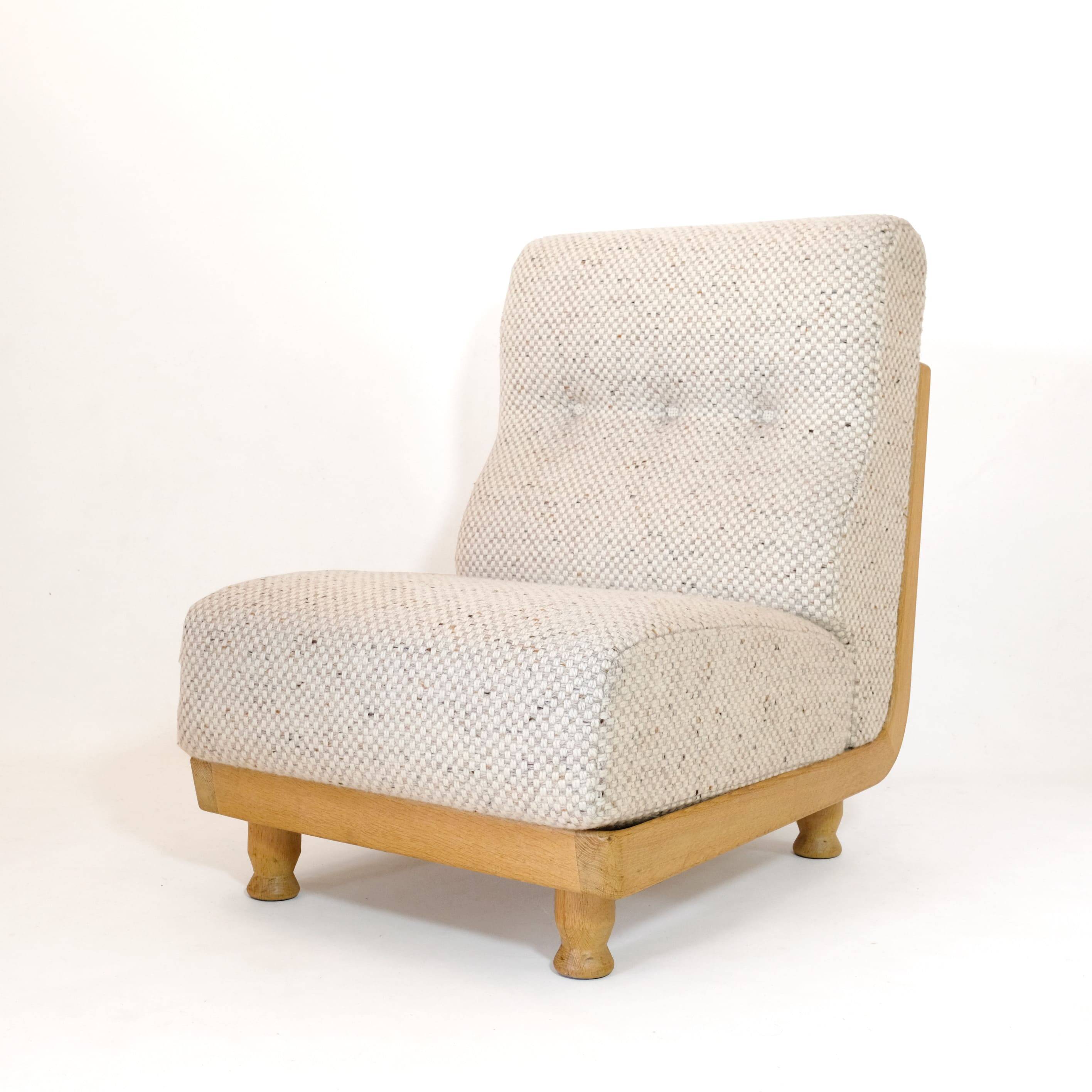 Robert Guillerme & Jacques Chambron, armchair upholstered in beige fabric.