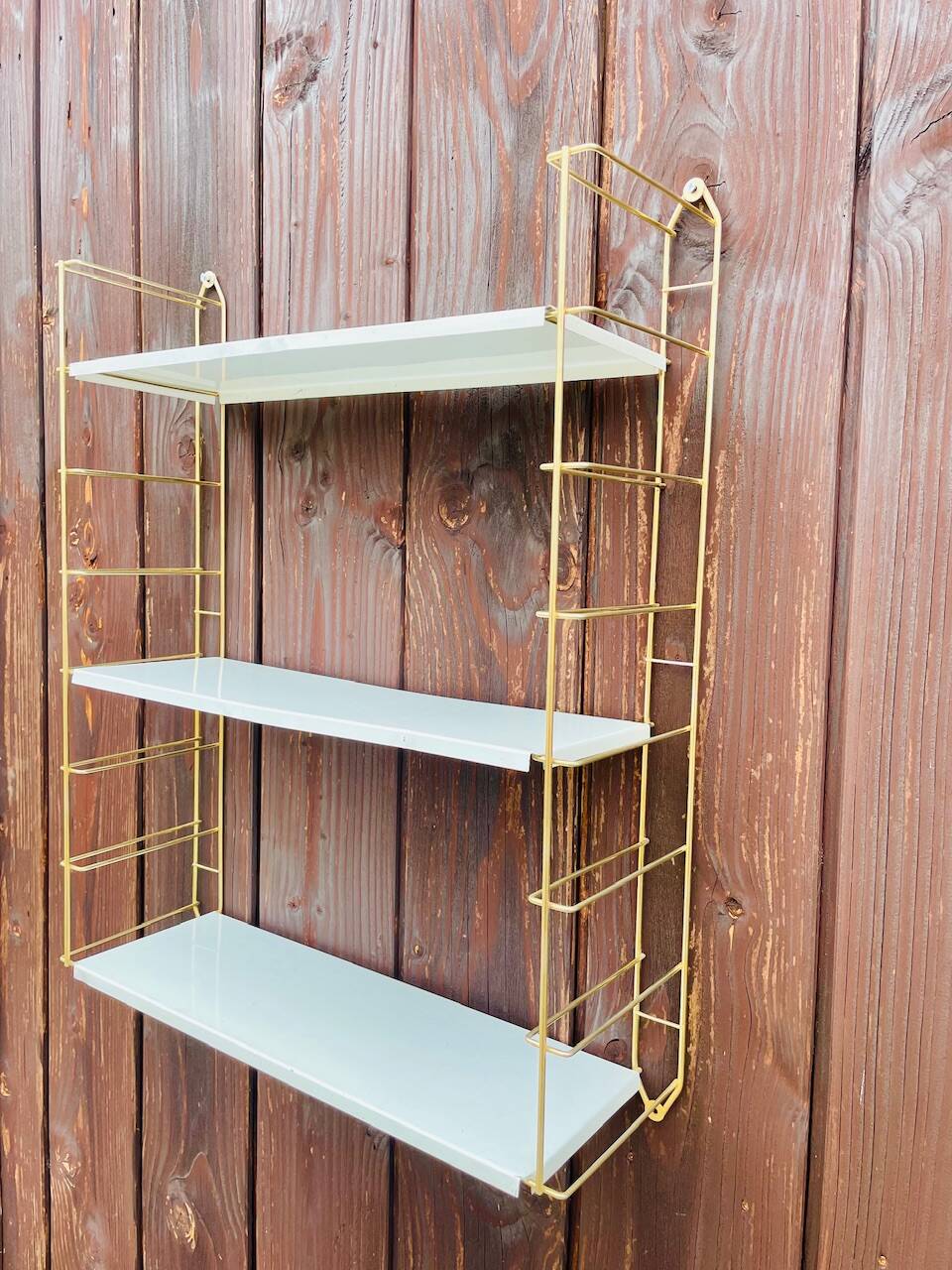 Vintage modular wall shelf, metal and brass, circa 1960s