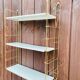 Vintage modular wall shelf, metal and brass, circa 1960s