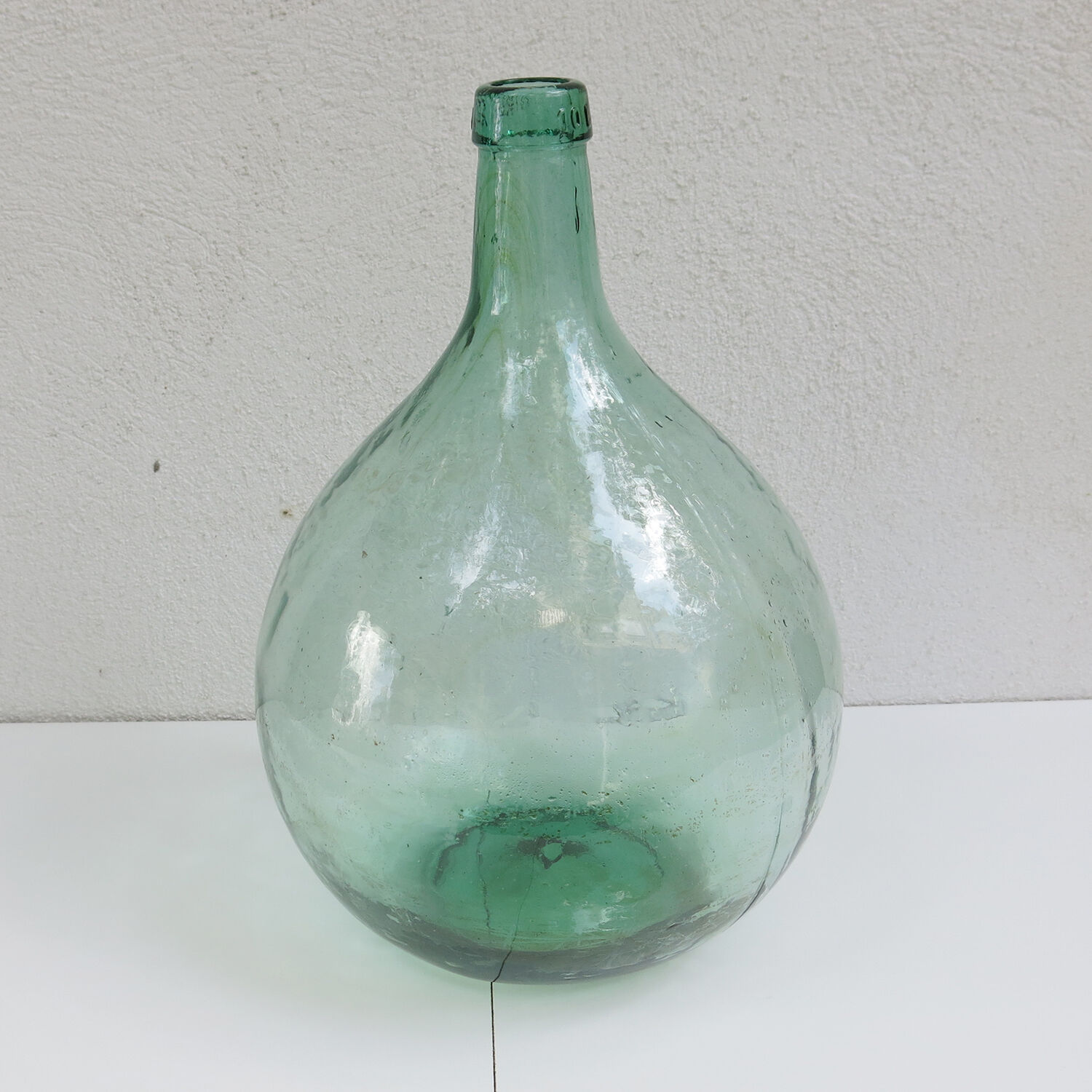 Vintage glass demijohn