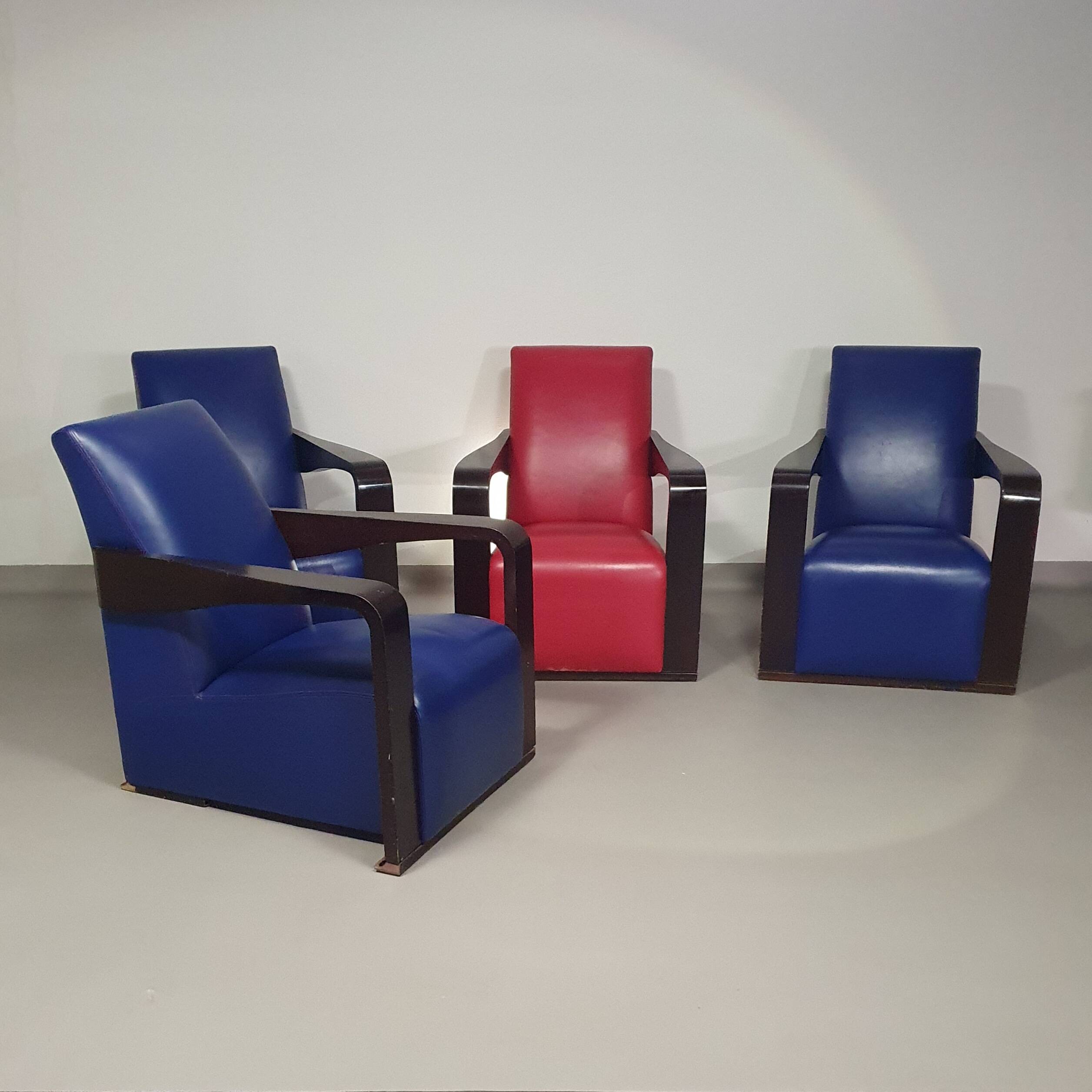 4 x Vintage Ying lounge chairs / fauteuils van Hugues Chevalier,'90. 3 x blue / 1 x red leather