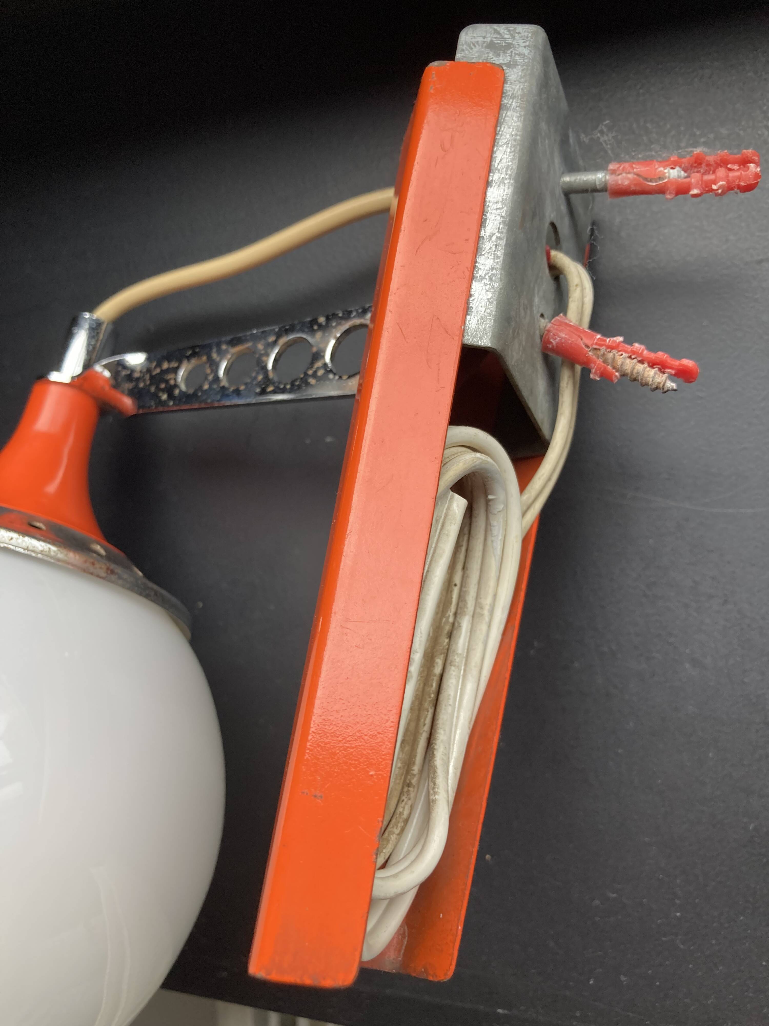 Set of two vintage orange wall lights from the 70s