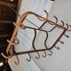 pig holder, wrought iron hook support