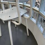 White/grey Formica chairs