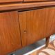 Vintage Scandinavian teak sideboard with compass feet from the 70s