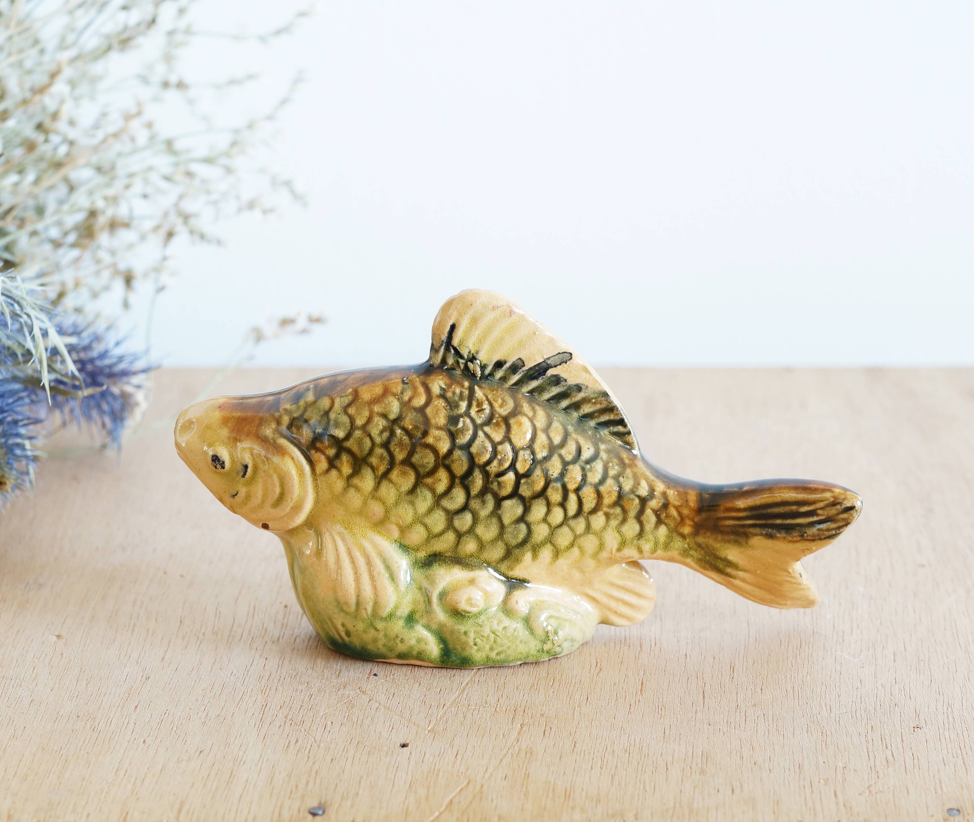 Small earthenware fish figurine