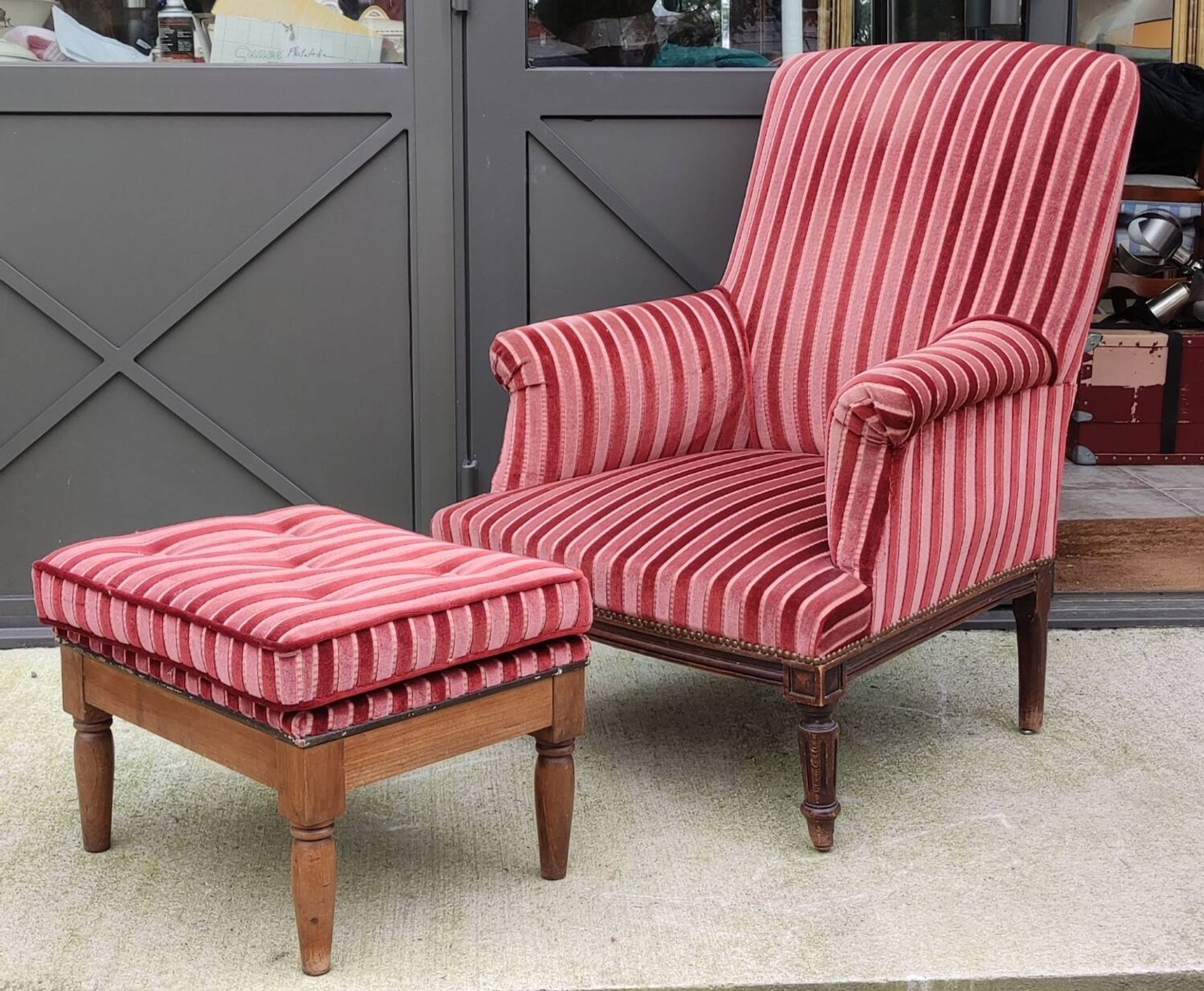 Old armchair and its Louis XVI style footrest/velvet covering