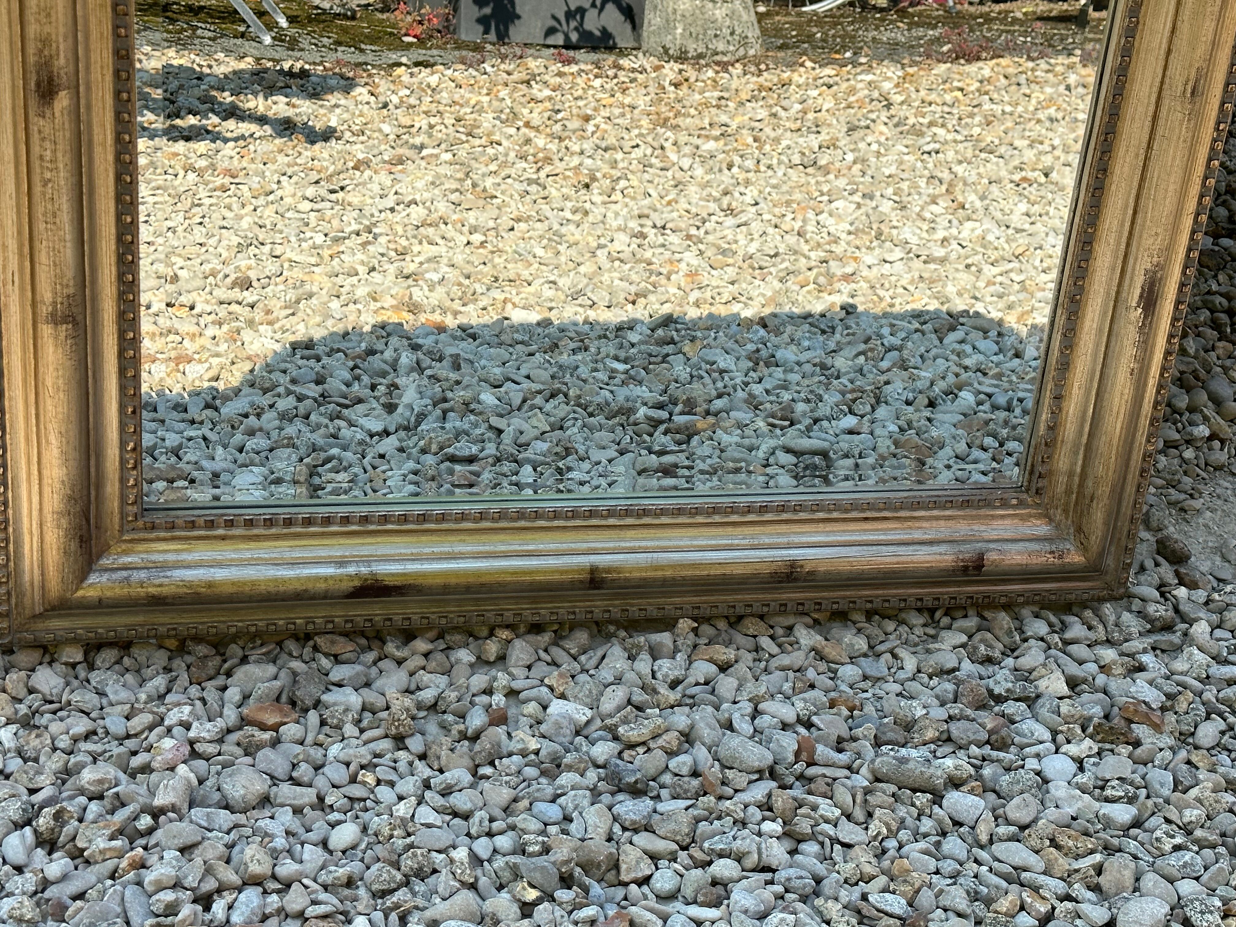 Louis Philippe style mirror in wood and gilded stuck 105,5x75cm