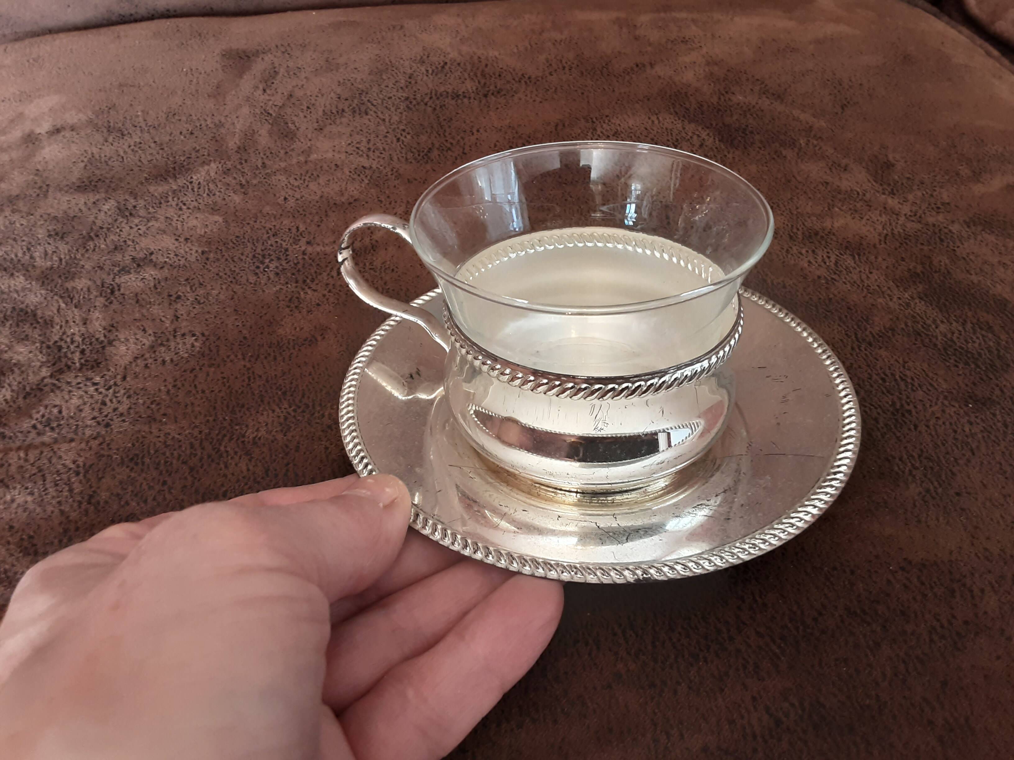 Set of 2 metal cups and saucers