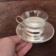 Set of 2 metal cups and saucers
