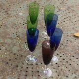 Set of 7 champagne flutes in colored glass and transparent base, vintage