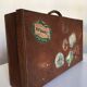 Suitcase of leather with labels of palaces