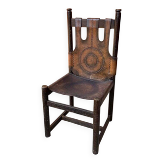 Handcrafted brown leather armchair, dark wood frame, circular pattern - 1970s.