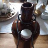 Bouteille ancienne en grès vernissé