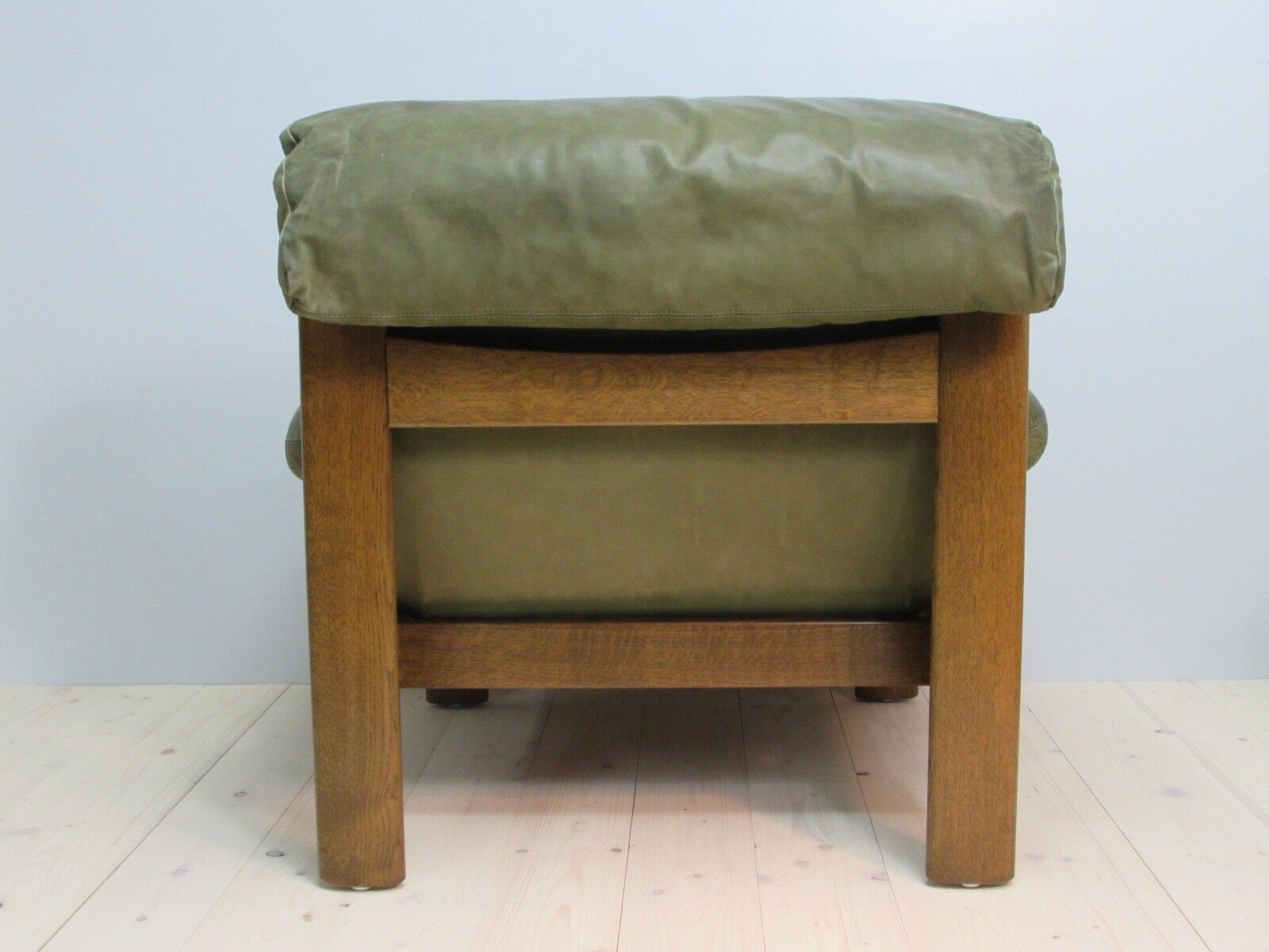 Armchair and footstool - green leather - 1960s