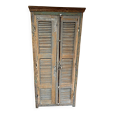 Wooden louvered wardrobe