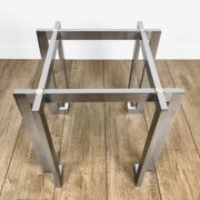 Brushed stainless steel design side table and 70s smoked glass