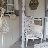 Whitewashed effect torchiere on wood