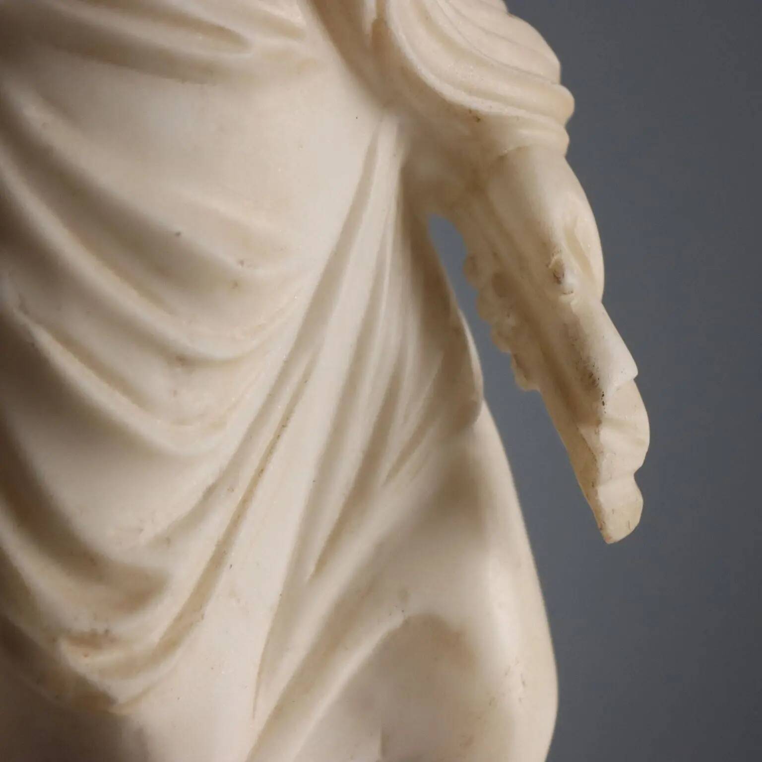 Sculpture of a Roman matron in white marble, Italy, 19th century.