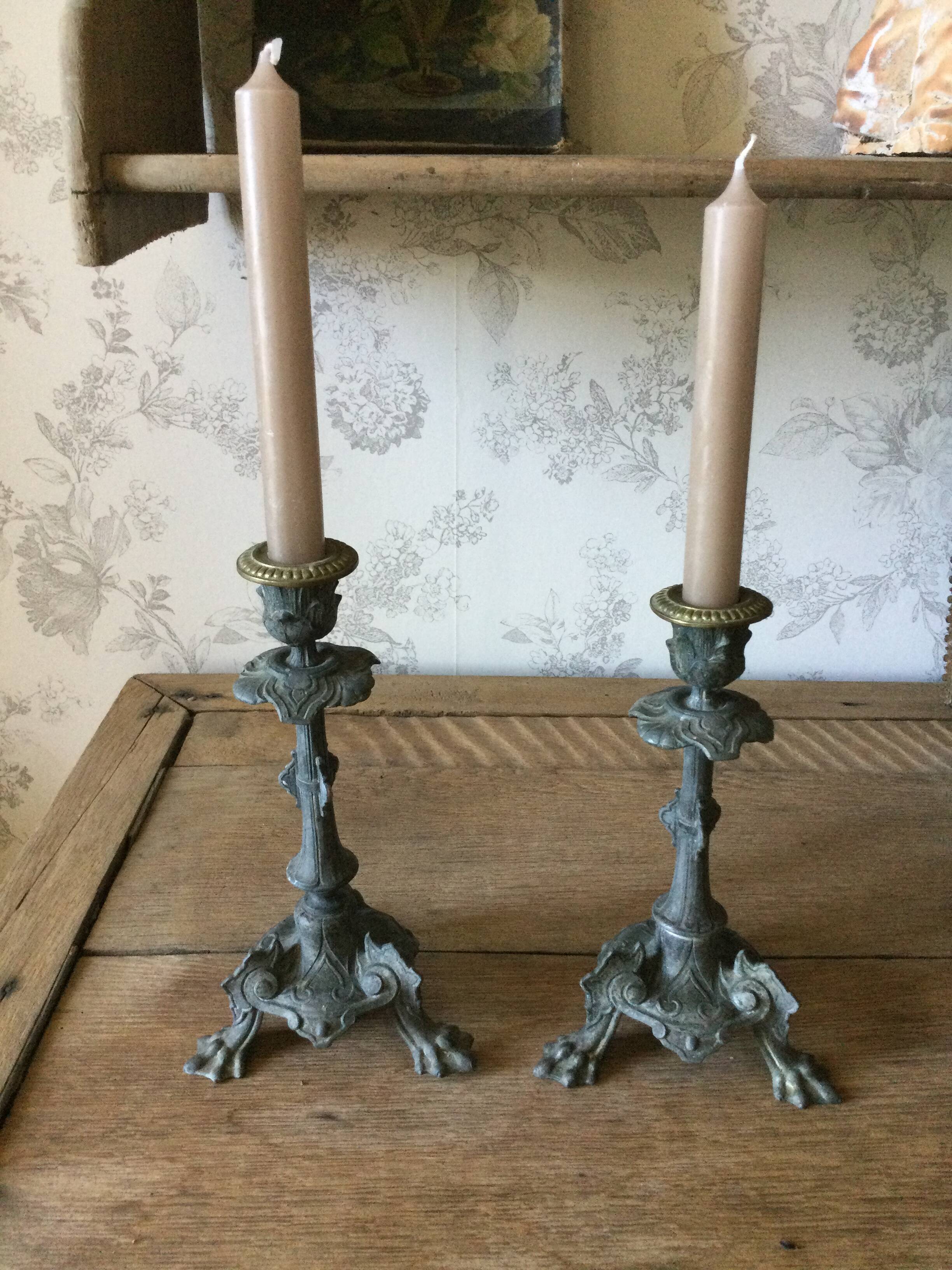 Set of 2 antique candlesticks in spelter.