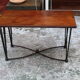 Black metal footing wooden coffee table
