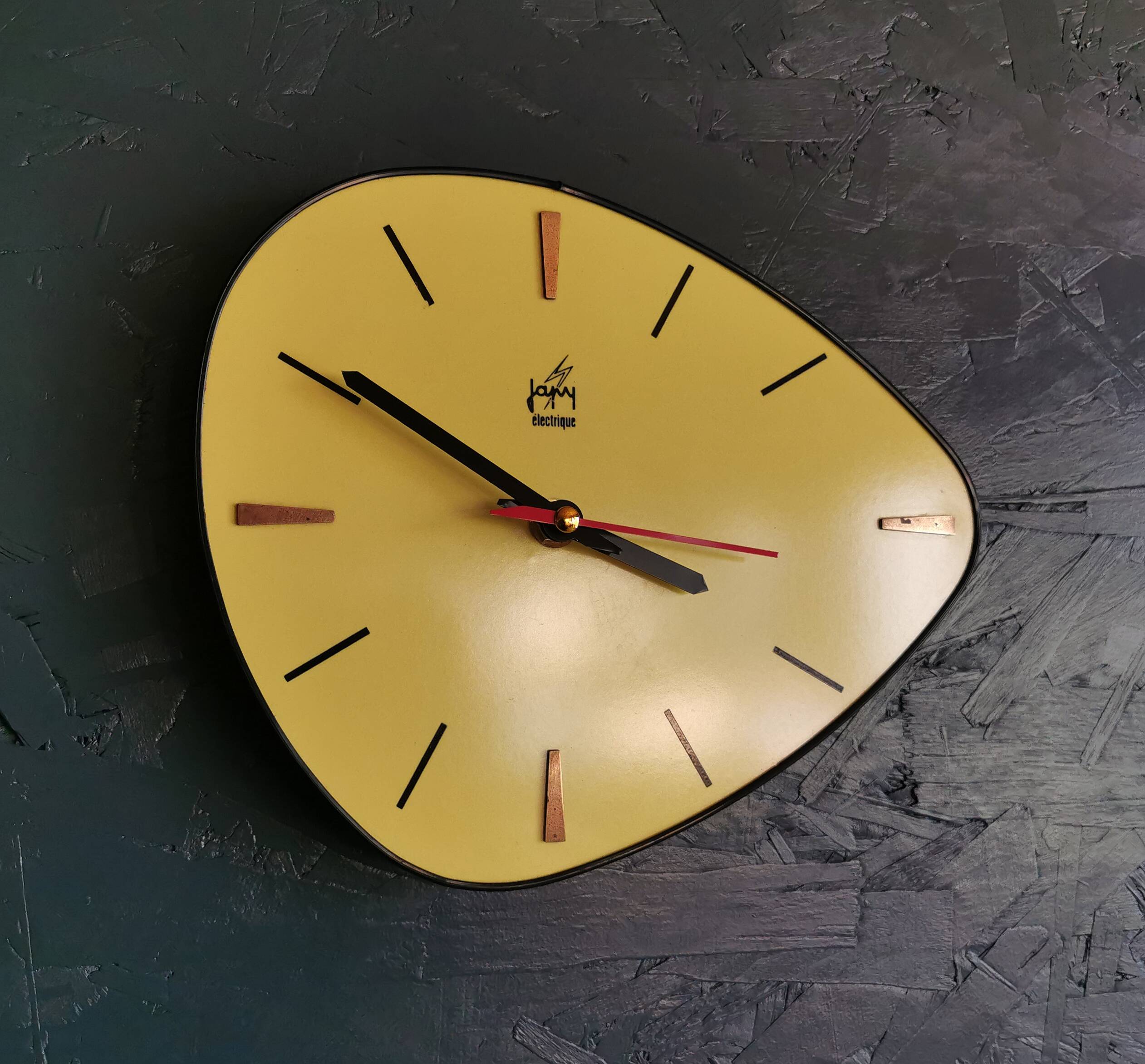 Vintage Formica clock silent asymmetrical wall pendulum "Yellow Japy"