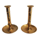 2 anciens bougeoirs poussoir en laiton
