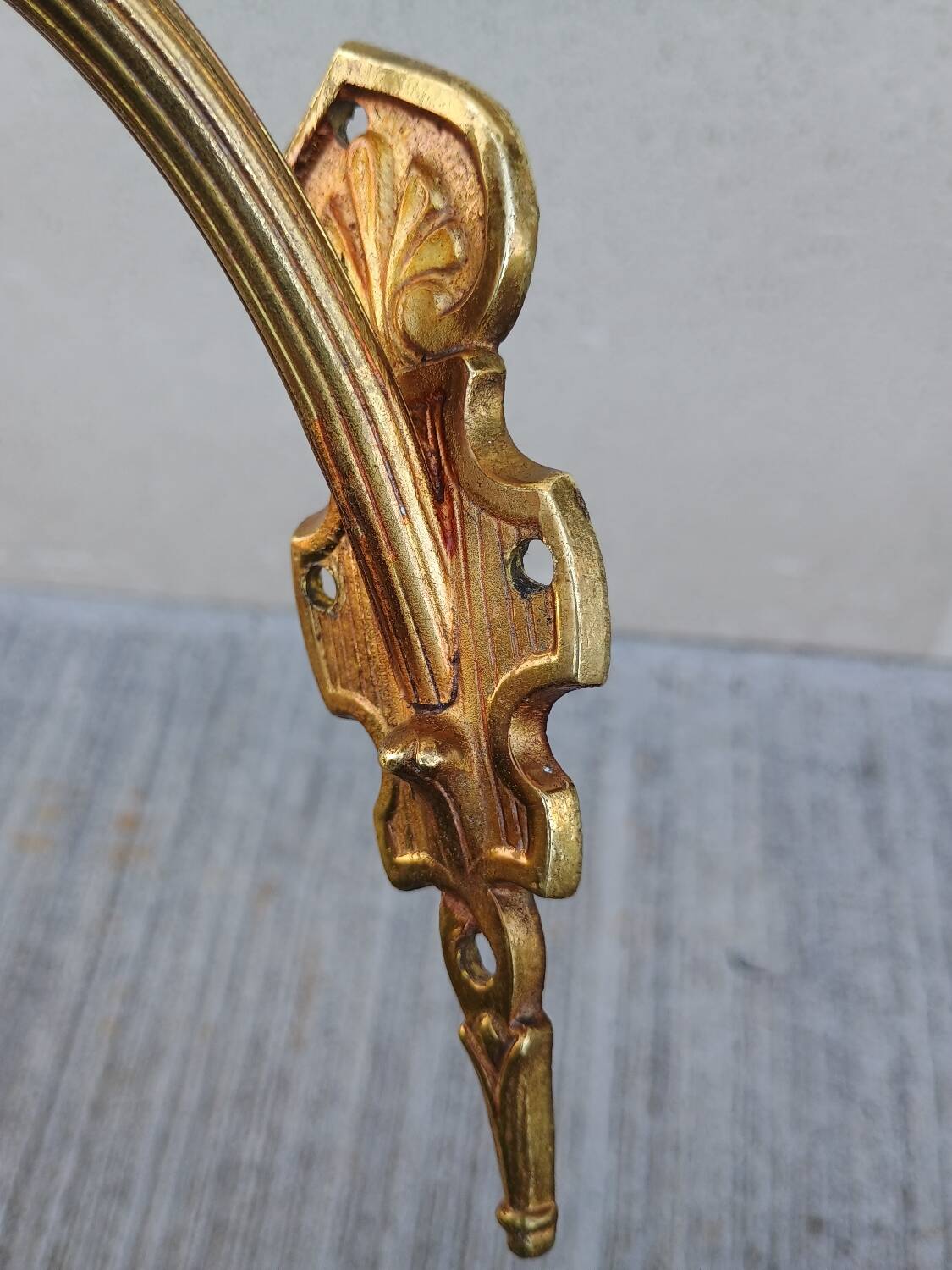 Pair of frosted glass wall lights with brass attachments, circa 1970