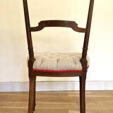 Charivari upholstered chair