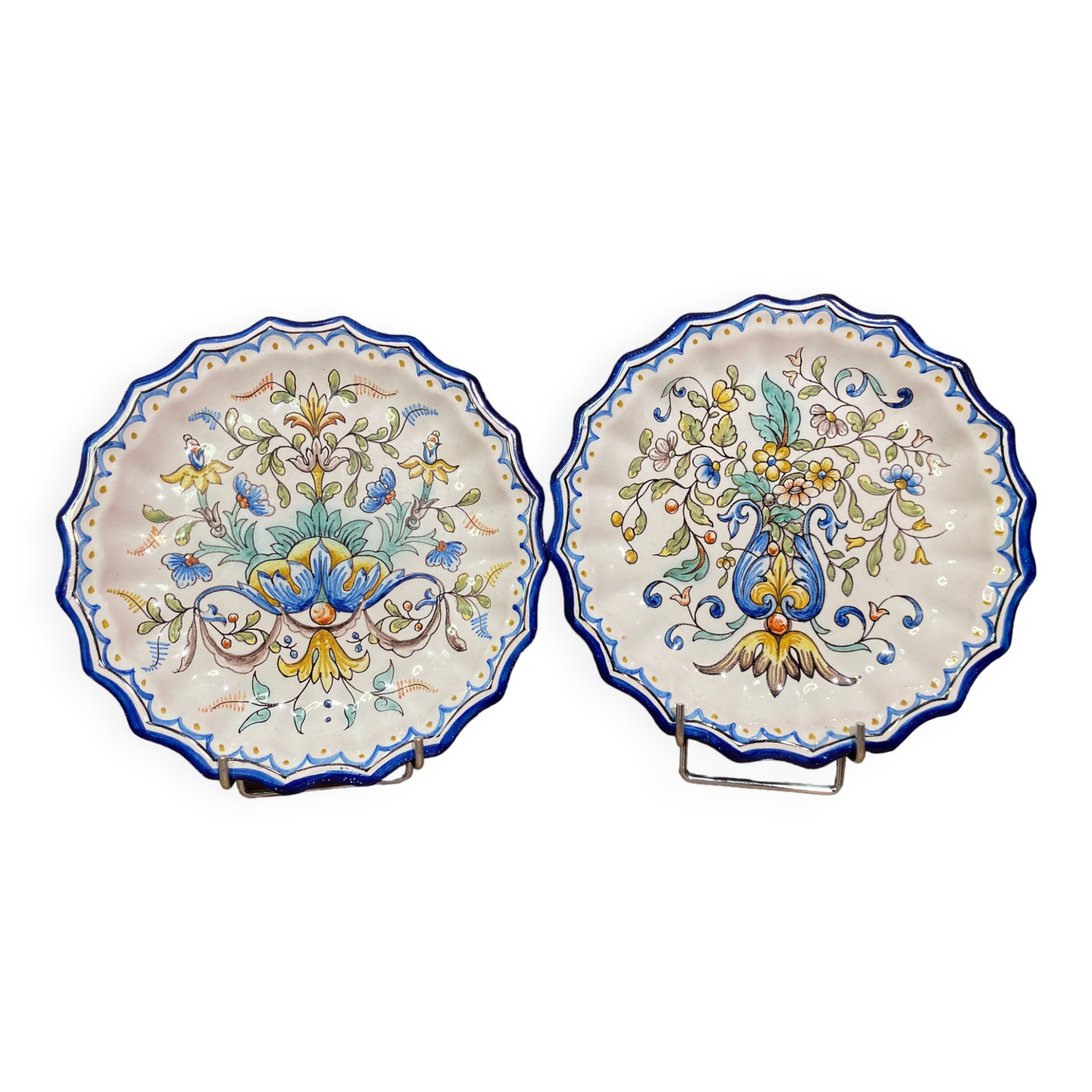 Pair of plates with floral decoration in Nevers earthenware signed Montagnon