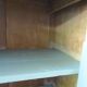 Small vintage Parisian sideboard with 2 doors and 2 drawers, enhanced in verdigris