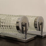 Wall lamps in worked glass and chromed metal, Italy 70's