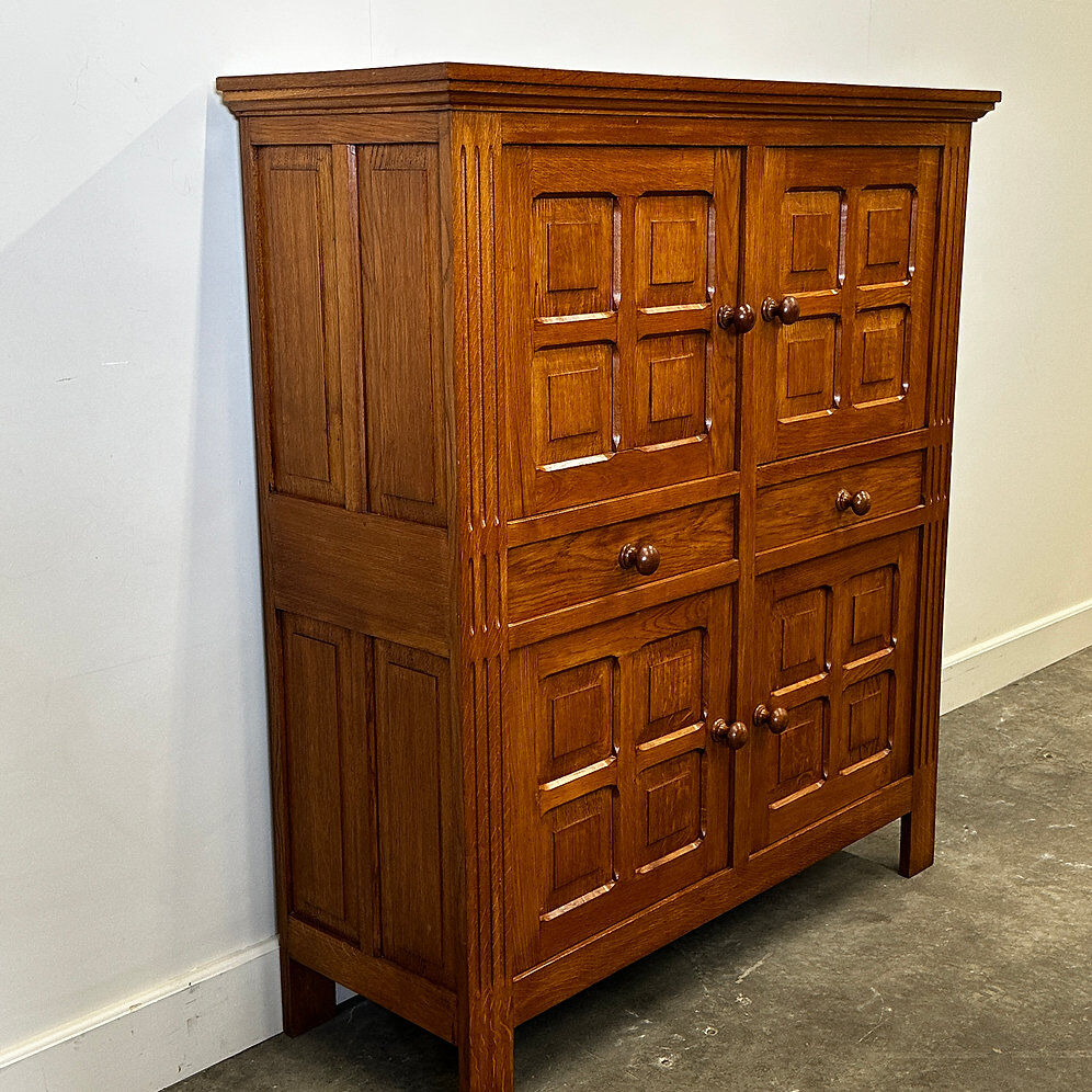 Artisan brutalist oak cabinet with turned knobs, France, 1970s