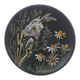 Black ceramic plate with wildflower design, Ruscha Art Pottery, Germany.
