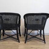 Paire de fauteuils noirs en rotin