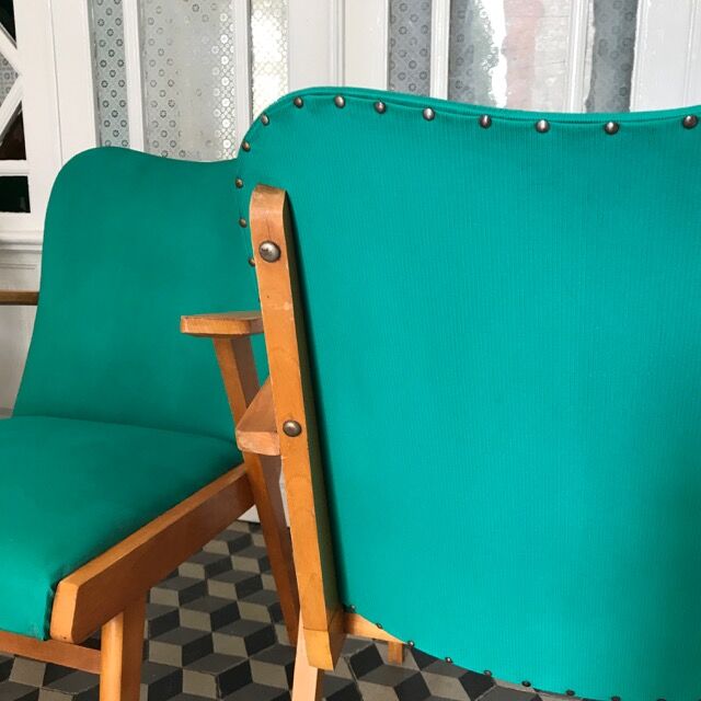 Fauteuil vintage bois et skaï vert