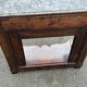 Mahogany console with grey marble top and lion paw feet.