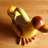 Ceramic watering can in white earthenware, yellow enamel and bird shape