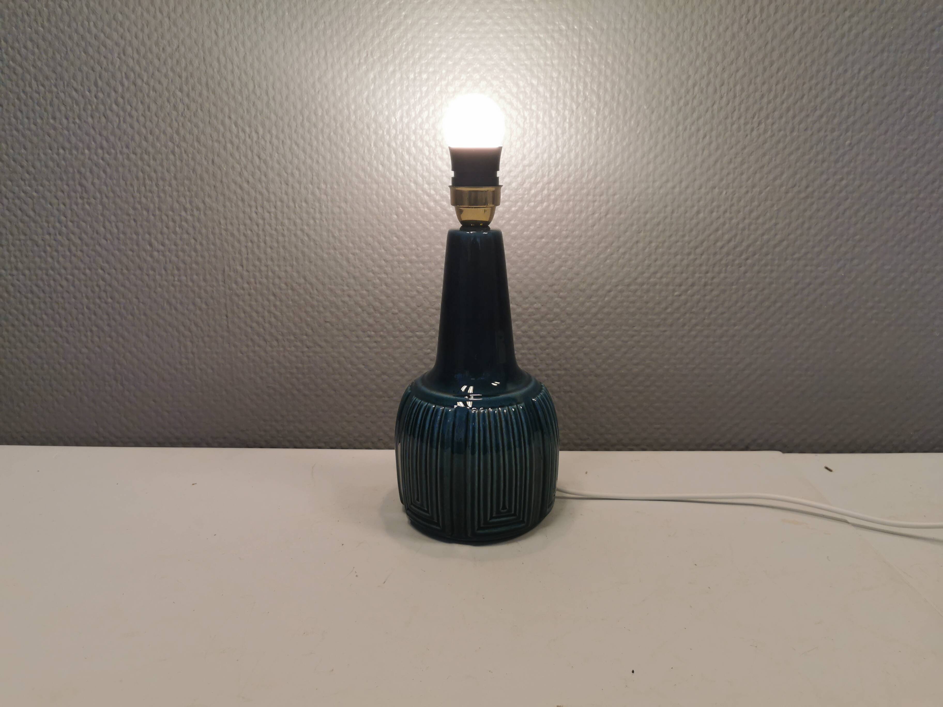 Elegant mid-century ceramic table lamp with an embossed pattern covered in mother-of-pearl glaze.