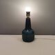 Elegant mid-century ceramic table lamp with an embossed pattern covered in mother-of-pearl glaze.