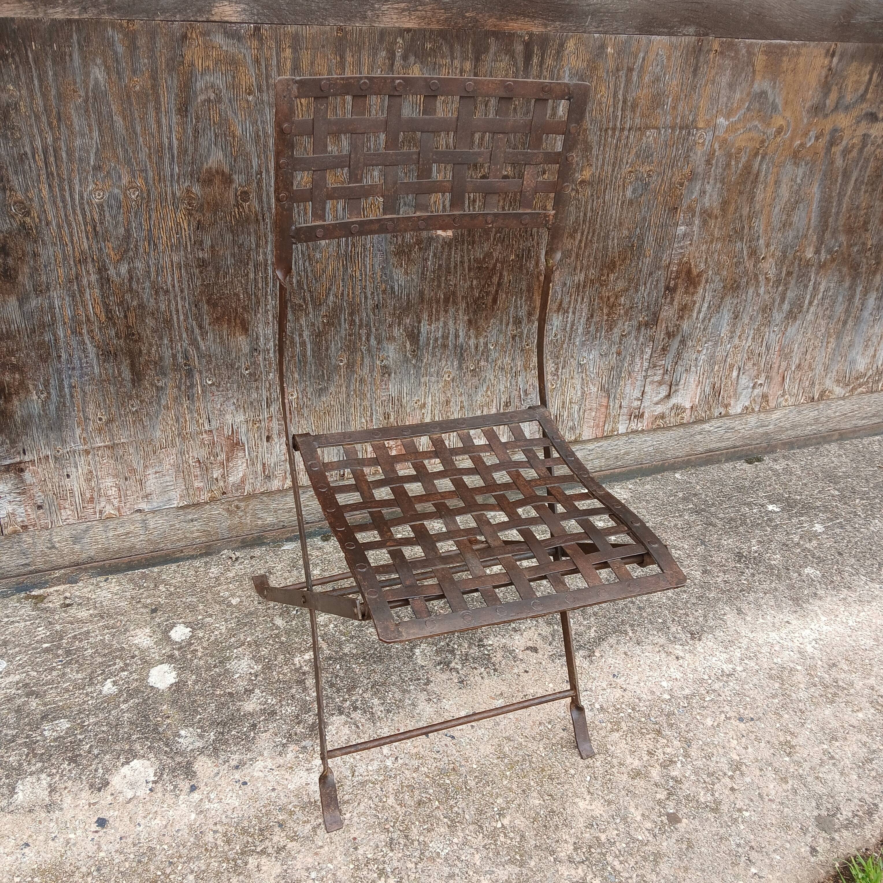 3 wrought iron chairs